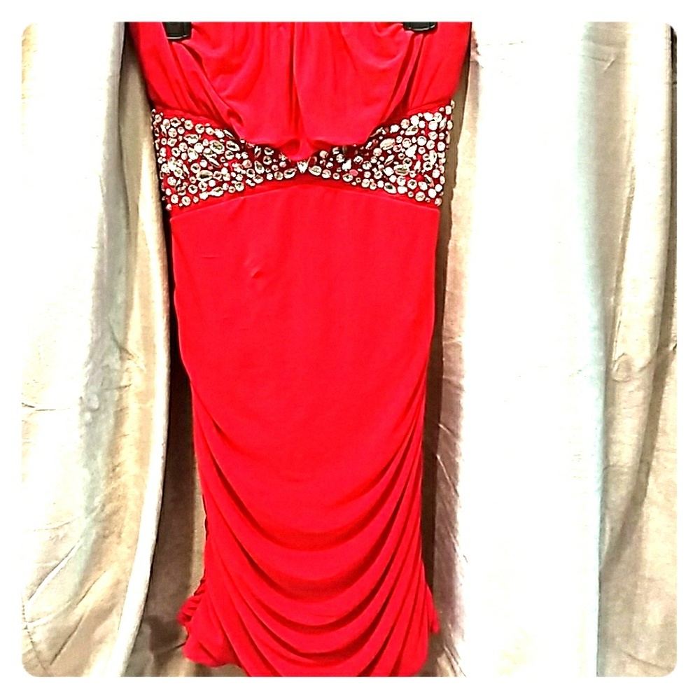 Red tight fitting strapless dress
